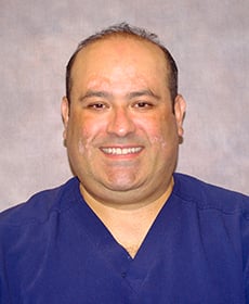 Headshot of Carlos Sandoval-Herrera